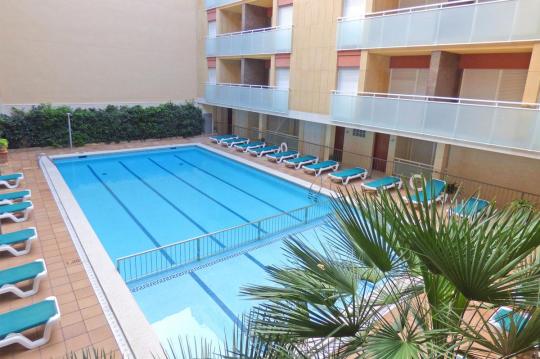 Beach holiday rentals apartments with pool and hotel facilities at cheaper prices than Barcelona apartments. 