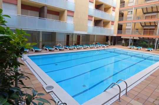 Beach holiday rentals apartments with pool and hotel facilities at cheaper prices than Barcelona apartments.  